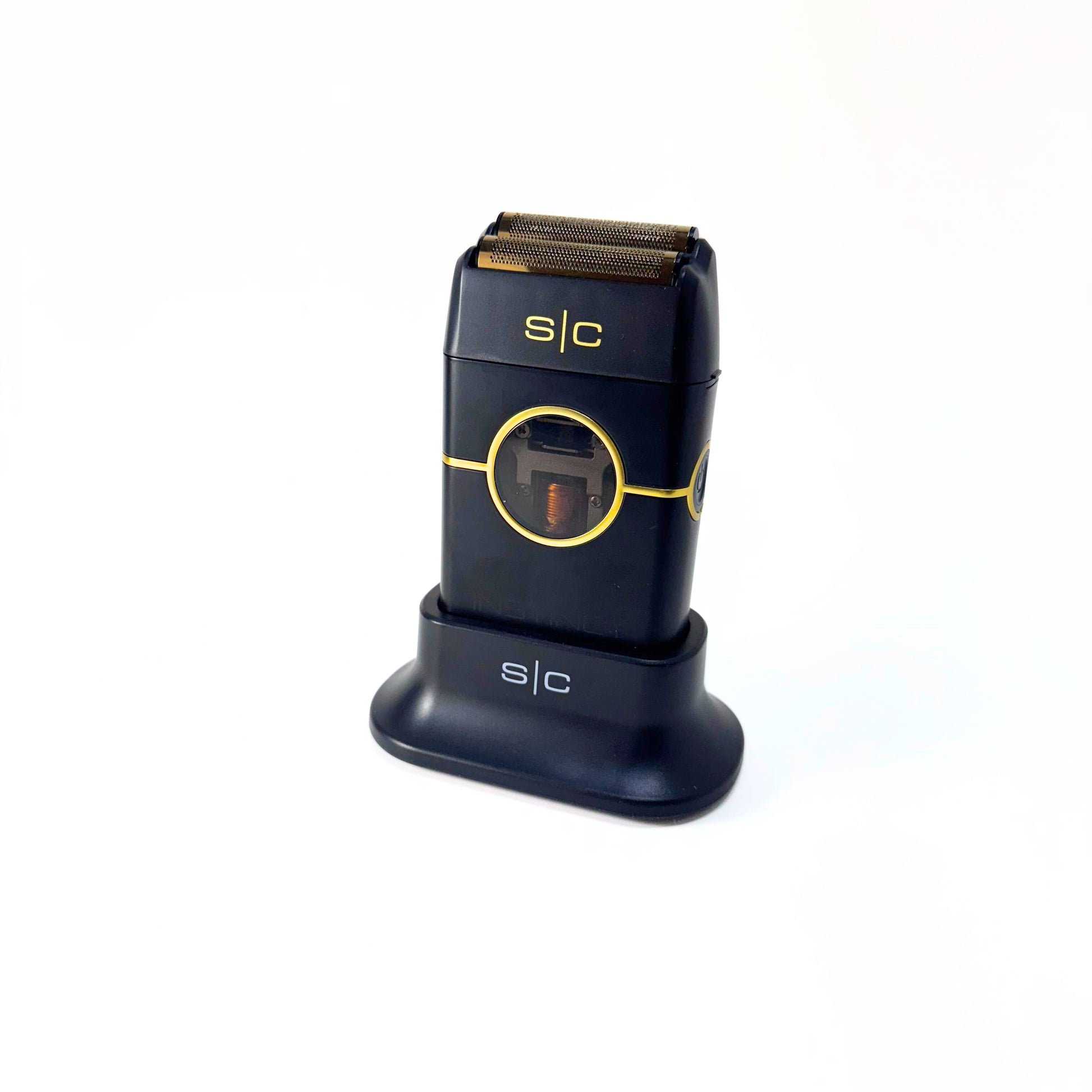 StyleCraft Instinct Metal Double Foil Cordless Shaver SC807B on charger stand