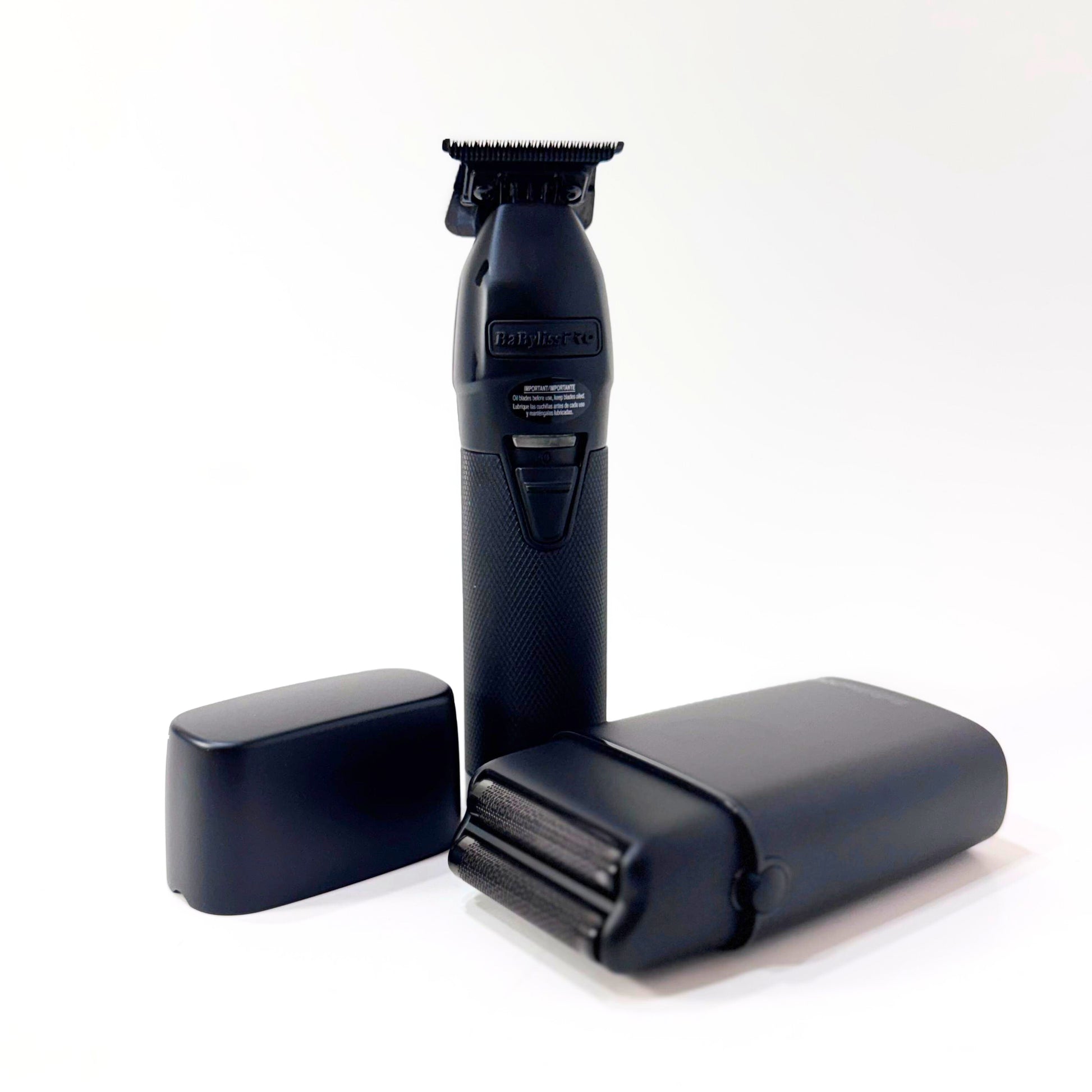 babylisspro matte black fx trimmer shaver combo shaver next to trimmer cap off